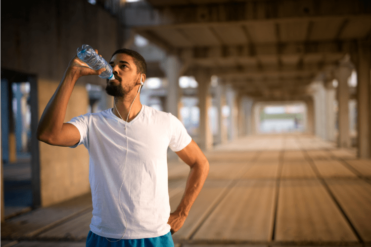 Men drinking alkaline water