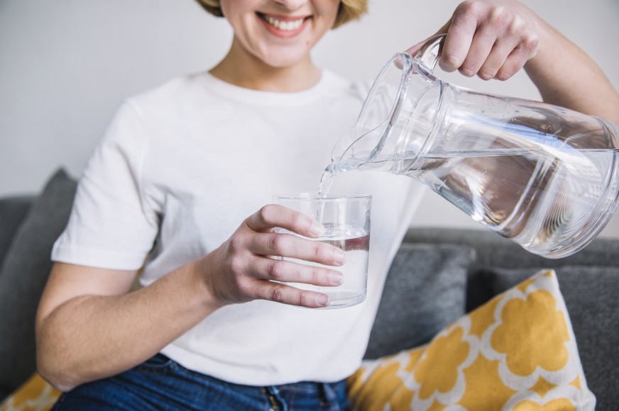 Healthy women drinking alkaline water